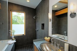 Shower and sink in modern bathroom